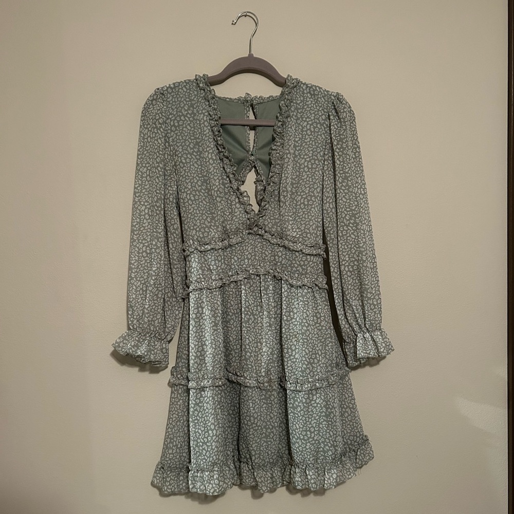 beautiful light green dress with an open back